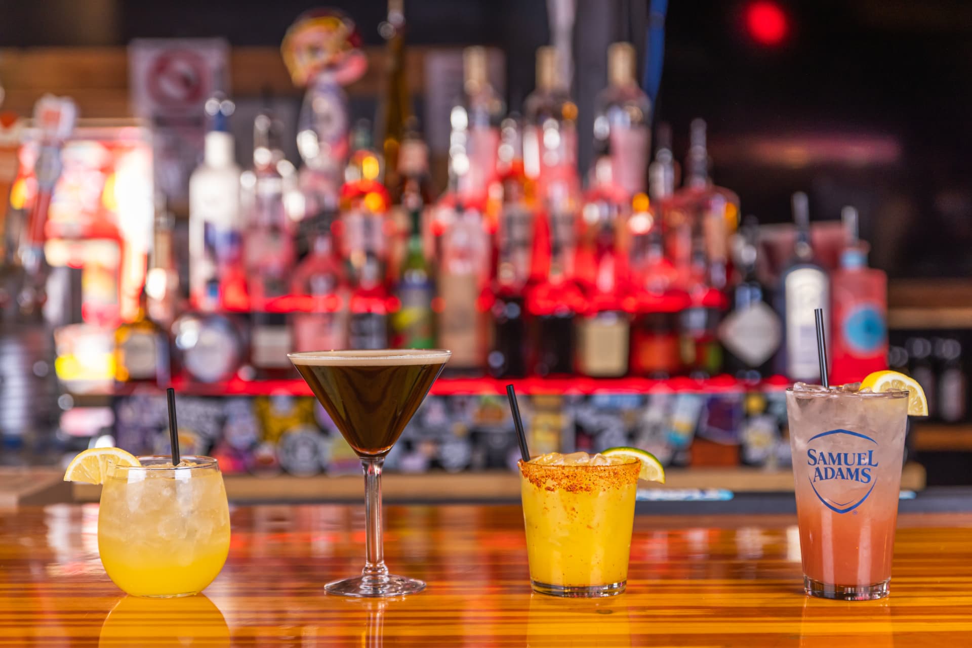 Row of craft cocktails lined up on the bar at Rack in Old Town Scottsdale